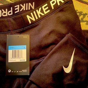 Nike Pro women’s compression 3/4 leggings. Black. Never worn.